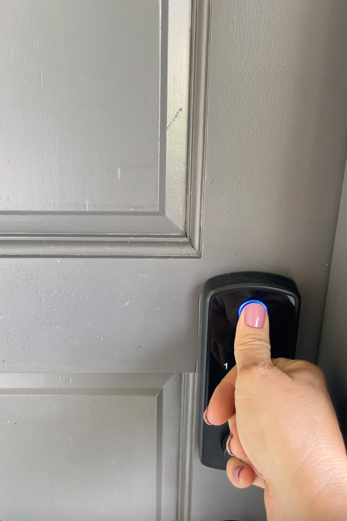 New electronic, keyless lock installed on a freshly painted door.